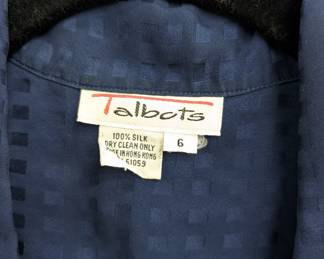 Closeup of Talbot's 100% silk dark blue button front short-sleeved blouse, size 6