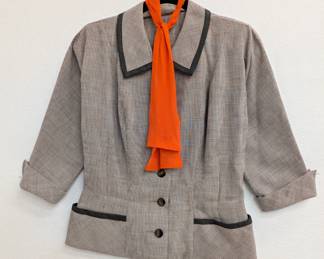 Vintage R & K Originals black and white plaid jacket with 3/4 length cuffed sleeves, orange necktie and black trim