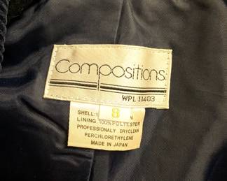 Closeup of vintage Compositions dark grey corduroy two-button blazer size 8