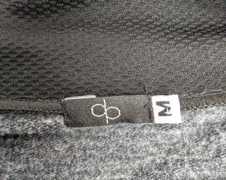 Closeup of the black cowl neck wrap front sweater size M