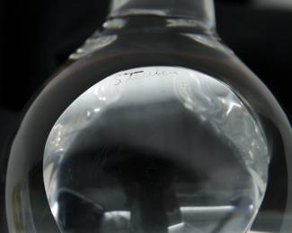 Closeup of one of three Steuben Glass Bird Figurines – A delightfully diverse flock of Steuben glass bird figurines, each with etched Steuben signature: Wren model No. 8603 is a 1990 Lloyd Atkins design, Wild Dove model No. 8426 designed by Bernard X. Wolff in 1973, and Songbird model No. 8112 designed by George Thompson in 1963. Stylish, charming, and whimsical wildlife in sparkling clear hand blown glass to nest in your home and heart.