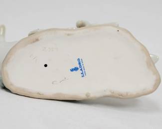 Another view of the A Lladro "Little Ducks After Mother" porcelain figurine