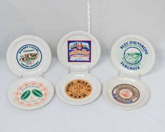 Six vintage French "Fromages de France" cheese plates by Faience De St Amand, each featuring a different traditional French cheese design. For the gourmand and cheese lover on your Christmas list!