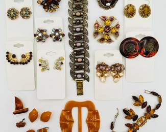 Vintage fashion jewelry earrings and bracelets, aurora borealis crystal jewelry, a lovely warm tone rhinestone bracelet with matching earrings, and a gold and amber sailboat brooch, a pair of real amber clip earrings