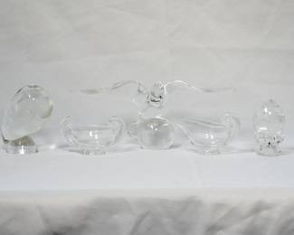 A vintage Steuben crystal owl figurine/paperweight (designed by Donald Pollard in the mid-1950s), a charming mid-century modern signed Steuben crystal scroll handle sugar bowl and creamer (created by designer Irene Benton in 1947, in production 1940s through at least 1957); a large signed Steuben glass classic eagle sculpture, and a signed Steuben crystal "controlled bubble" egg figurine paperweight designed by Lloyd Atkins