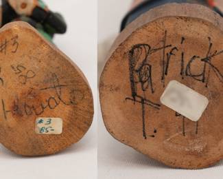 Signatures on two of the three Hopi Kachina dolls hand crafted and signed by Native America artists