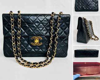 A vintage Chanel Classic Flap Bag, black quilted lambskin leather with gold-tone hardware—an interlocking CC turnlock clasp—and a chain strap laced with leather. Authenticated by Entropy.