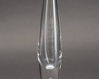 Steuben Glass Teardrop Bud Vase Barrett Browning Poem – A solitary air bubble is suspended in the solid glass base of this Steuben iconic vase designed by David Hills and introduced in 1949. Engraved with calligraphy that reads “How do I love thee, let me count the ways" –  a line from Elizabeth Barret Browning’s poem, Sonnet 43, from her Sonnets from the Portuguese. This vase is seen in the Steuben centennial catalog, shape No. 7989J, and measures 8 inches H. Steuben signature on underside of the base. 