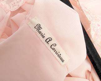 Closeup of a vintage Marie A. Carriveau peach-colored nightgown and robe set with lace and ribbon detailing, sweet retro lingerie / sleepwear