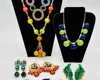Go bright with the bling in these playful color necklaces and earrings