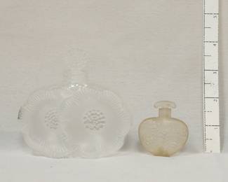 A signed Lalique France Deux Fleurs (Two Flowers) perfume bottle in satin-finished crystal, originally designed by René Lalique in 1935; and a vintage heart-shaped frosted glass perfume bottle with glass stopper