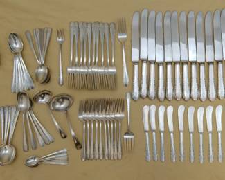 International Silver "Moonglow" pattern sterling silver service for ten with extras. (Knives are sterling handled, butter knives are solid sterling silver.)