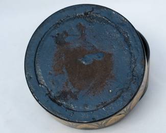 Closeup of underside of pair of Victorian papier-mâché wine bottle coasters