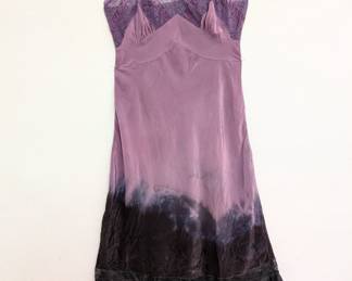 A rather slinky purple and black tie-dye slip dress with lace trim
