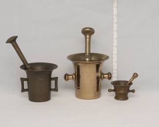 Three vintage brass mortar and pestle sets
