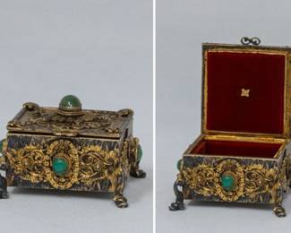Antique jewelry or trinket box, resting on four dolphin feet, set with green hardstone cabochons and lined red with velvet