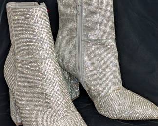 Step out in rhinestone dazzle from pointed toes to block heels with this pair of Madden Girl's Flexx-R booties, size 7.5M