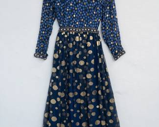 A delightful vintage Adele Simpson navy silk evening dress embellished with gold and blue polka dots, from I. Magnin  