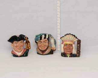 Three vintage Royal Doulton character jugs or Toby jugs from the 1960s – Night Watchman, The Falconer, and North American Indian