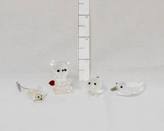 Swarovski crystal figurines - a teddy bear, mouse, duck, and pig