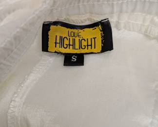 Closeup of Love Highlight women's white vertical fringe striped drawstring pants size S