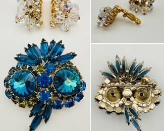 A fabulous owl-shaped brooch by Delizza and Elster aka Julianna with marine blue blue and olive green rhinestones and blue-green rivoli shaped eyes in gold tone metal, and a pair of Aurora Borealis crystal cluster earrings that may also be D and E aka Julianna