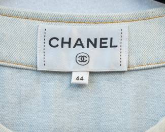 Closeup of Chanel denim dress with gold buttons, size 44