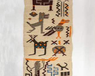 A Zapotec hand-woven wool rug (Zapotec rugs are a traditional craft from the Oaxaca region of Mexico)