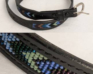 A stylish Masters Saddlery black tooled leather seed bead western belt