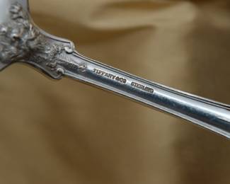 Closeup of one of the pieces from the stunning Tiffany sterling silver Olympian pattern flatware service for eight. The multi-motif Olympian pattern was introduced by Tiffany & Co. in 1878 and is the most elaborate and complex of all Tiffany flatware designs – each piece of Olympian is designed to illustrate a well-known story of Classical mythology; the subjects vary on the different pieces. Marked with Tiffany & Co Sterling. We also have five serving pieces in the same pattern available at this sale!