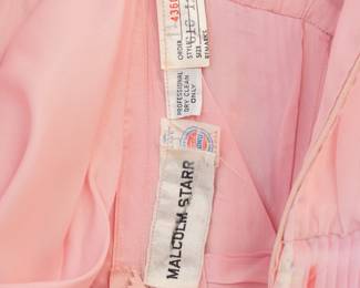 Closeup of vintage Malcolm Starr pink printed silk chiffon maxi dress, size 12