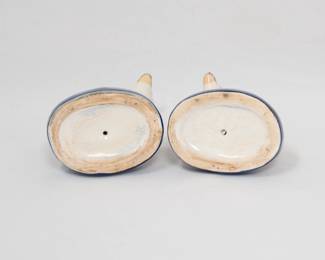 Another view of the pair of Staffordshire Dalmatian dog figures, modeled in mirrored positions and seated on cobalt bases. Hand painted polychrome enamels.