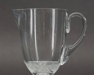 A signed Lalique crystal pitcher in the Phalsbourg pattern, 7 5/8 inches high, signed Lalique France in script on the base.  