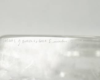 Closeup of one of two signed Mats Jonasson crystal sculptures of a polar bear and a river or sea otter. The sculpture is hand-crafted in Sweden at the Målerås Glass Works. 