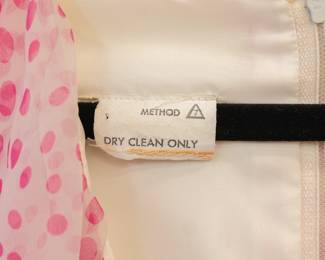 Closeup of the vintage belted pink polka dots floral maxi dress