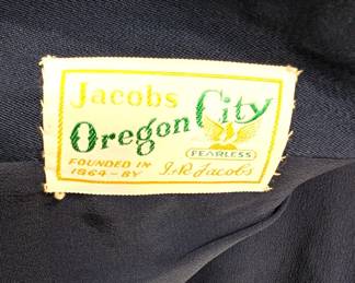 Closeup of vintage Jacobs Oregon City charcoal gray skirt suit with a fitted blazer and straight skirt
