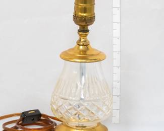 A vintage cut glass and brass lamp 