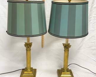 A vintage pair of neoclassical brass Corinthian column table lamps with green shades