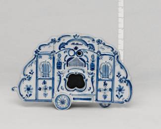 A vintage Delft Holland hand-painted ceramic musical miniature street organ with battery powered radio