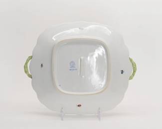 Another view of the Herend Porcelain cake or dessert platter vibrantly hand painted in the Rothschild Bird pattern with blue fish scale accents and applied floral handles. Herend stamp and hand painted model number to the underside. 11 1/2 inches L x 9 1/2 inches W.