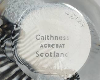Closeup of the signed Caithness Scotland 'Acrobat' paperweight