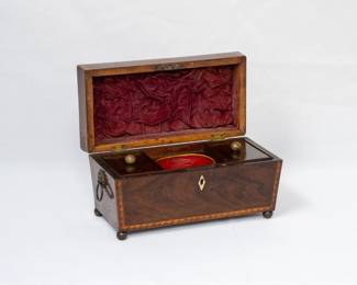 Another view of the antique English 18th/19th century coffer shape locking inlaid wooden tea caddy with lion head ring handles; velvet lined lid opening to reveal two lift up lids for tea storage and a compartment for mixing bowl.  Resting on 4 ball feet.