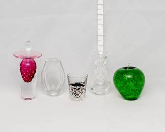A stunning Lewis Olson signed studio art glass stoppered perfume bottle, clear with red and encased controlled bubble design; a signed crystal vase, a vintage 1950s shot glass with roving "Googly Eyes," a vintage cut glass bud vase, and a vintage Wedgwood hand-blown green art glass apple paperweight