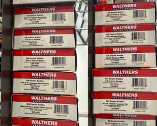 New in Box: Walthers Ready-to-Run Empire Builder: AC&F Baggage Dormitory 1200-1205 Series 932-9035, P-S 6-5-2 Sleeper Pass Series 932-9036, AC&F 36-Seat Diner Lake Series 932-9037, P-S 6-4-1 Lounge Observation Coulee Series 932-9038, Budd 48-Seat Vista Dome Coach 1320-1335 Series 932-9039, two boxes of AC&F 60-Seat Coach 1209-1214 Series 932-9031; an AC&F Baggage-Mail 37-42 Series 932-9032, P-S 7-4-3-1 Sleeper River Series 932-9033, an AC&F "Ranch" Lounge Car 1240-1245 Series 932-9034 