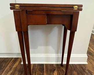 M106 - $25. Small Side Table. Measures 20" x 10" deep x 28.5" tall. (Intended to be a flip top table but it seems the 2 pieces have been glued together. Will NOT open larger. 