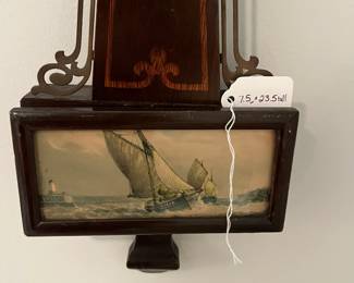 M46 - $25. Sessions Clock. Eight Day Lever Time. Mahogany Finish Case. Measures 7.5" wide x 23.5" tall. 