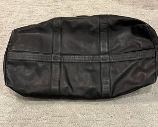 M115 - $140. Vintage COACH Black Leather Duffle Back. Measures 22" x 9" x 18". 