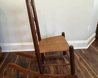 M85 - $40. Small Rocker with woven seat. 