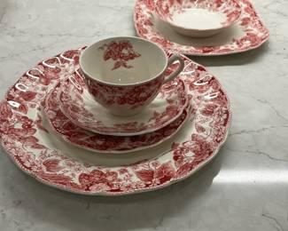 M22 - $300. "Strawberry Fair" Made in England Johnson Brothers. 8 dinner plates. 8 square salad plates. 8 Bread & Butter. 8 saucers. 7 cups. 8 Berry Bowls. 1 platter. 1 serving bowl. 1 gravy boat. 1 covered serving bowl. 