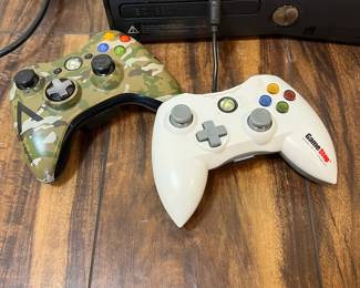 M90 - $50. XBox 360S Console. Model1439.  (MFR Date 9-2012). 2 controllers. 